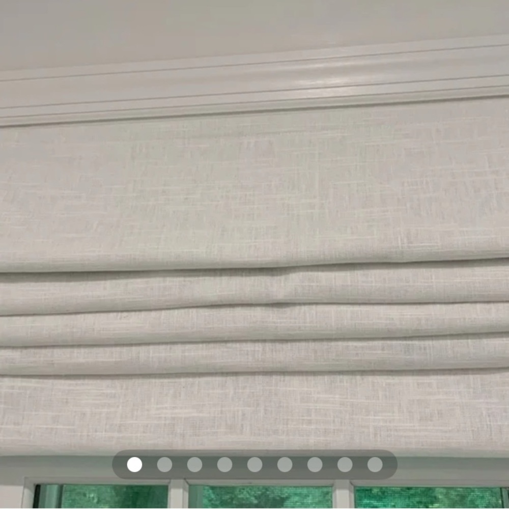 Pottery Barn Textured porcelain blue striped Roman Shade.